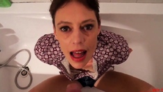 Short hair mature takes facial in the bathtub