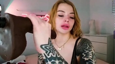 Solo pussy toying in the dark with redhead teen
