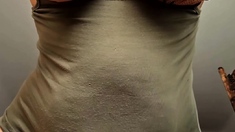 Hot babe with big boobs playing with her lactating boobs