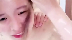Amateur asian masturbates