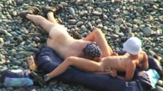 Voyeur on public beach. Oral sex