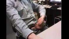 dad strokes cock at the office 3